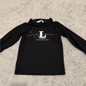 Black embellished turtle neck top